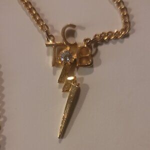 Elvis Presley TCB Necklace From Graceland!(TakinCareofBiz) Stands For